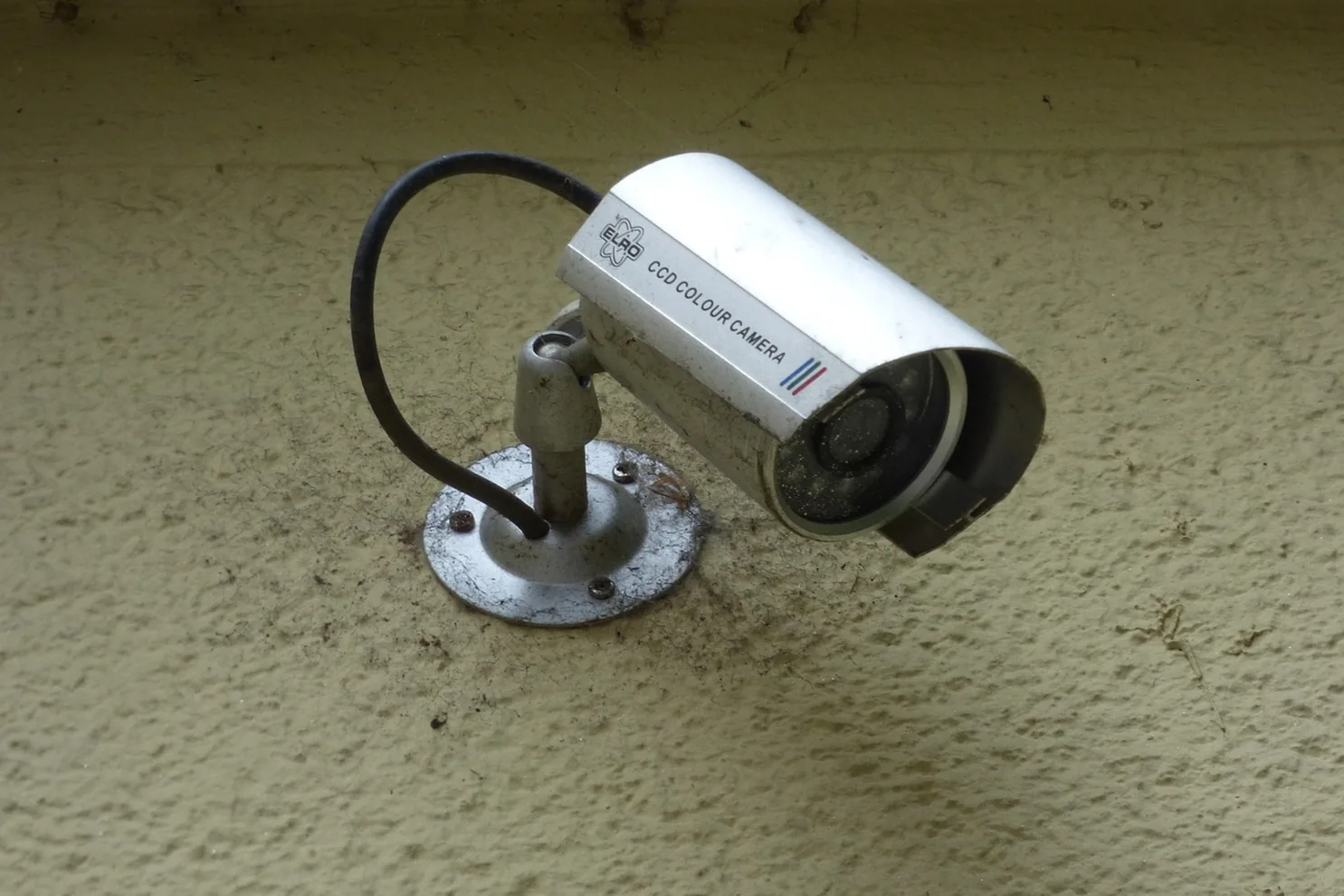 Security camera above a business entrance in Keller, TX